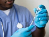 a doctor examining a patient's teeth
